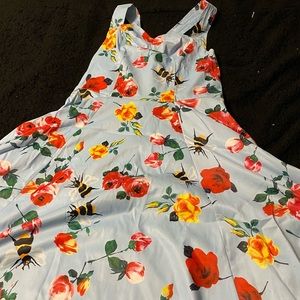 Halter tea dress with floral design.
